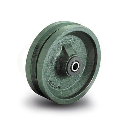 Green cast iron industrial wheel with metal bearing and axle on white background